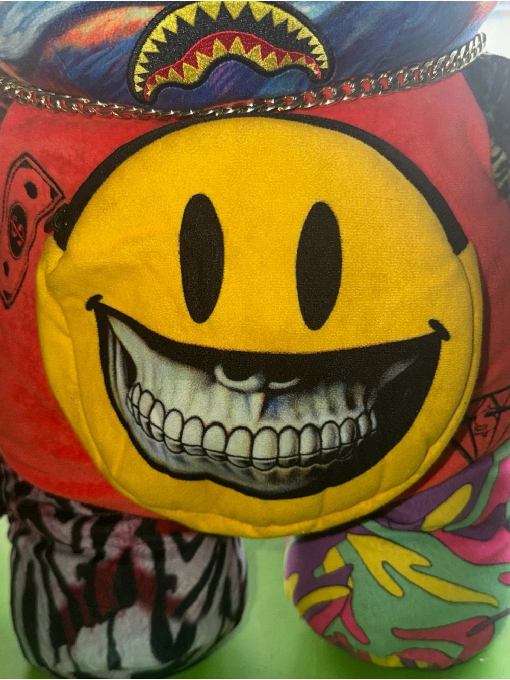 Sprayground Red Tag with Yellow Smiley and Gold Accent